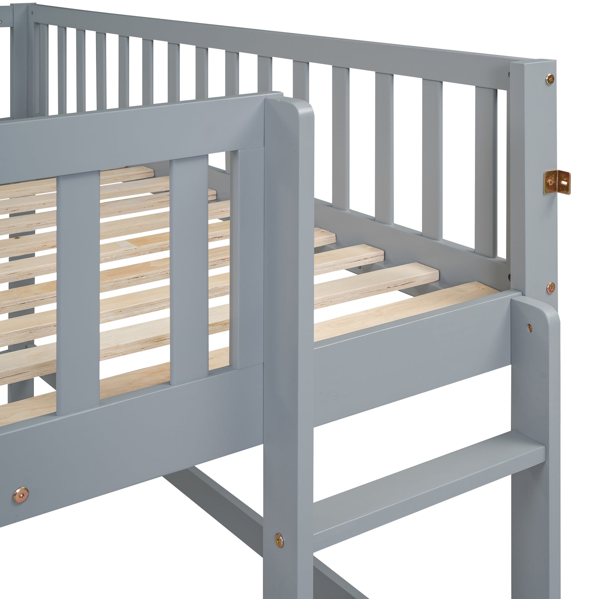 Gray wooden toddler bed frame with slatted base and safety rails