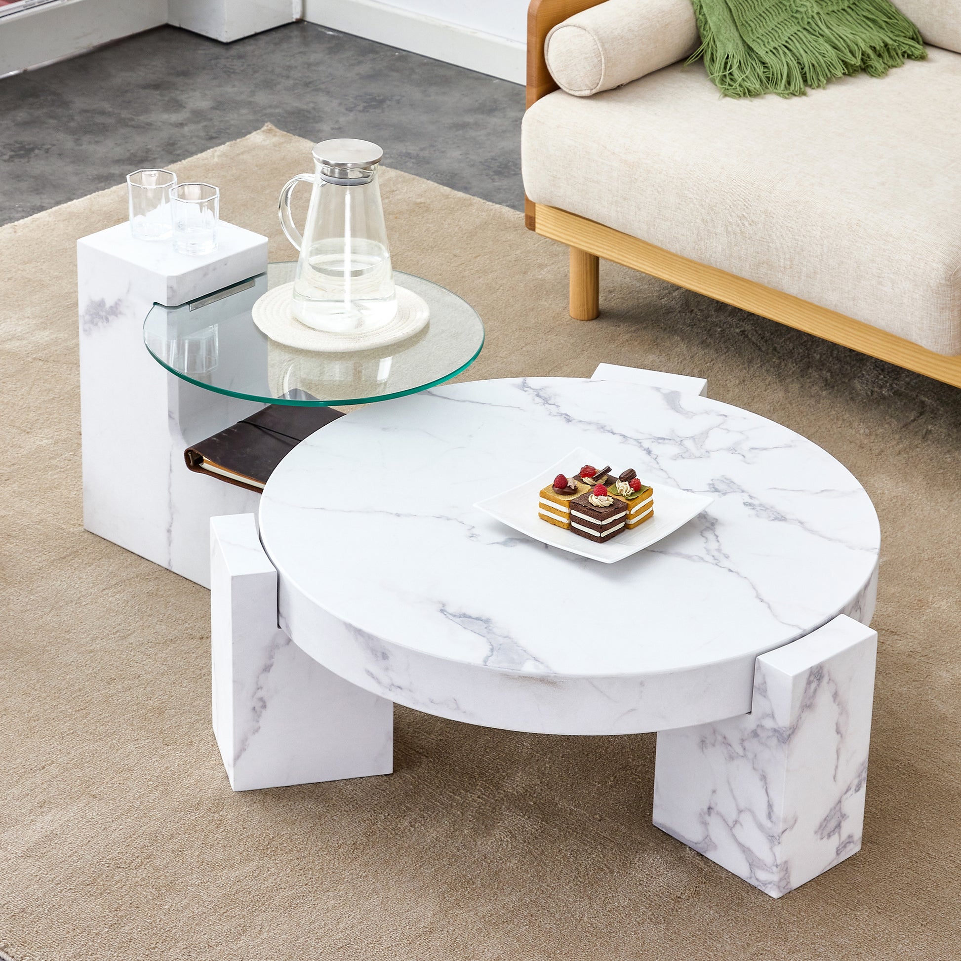 White marble round coffee table with dessert on top