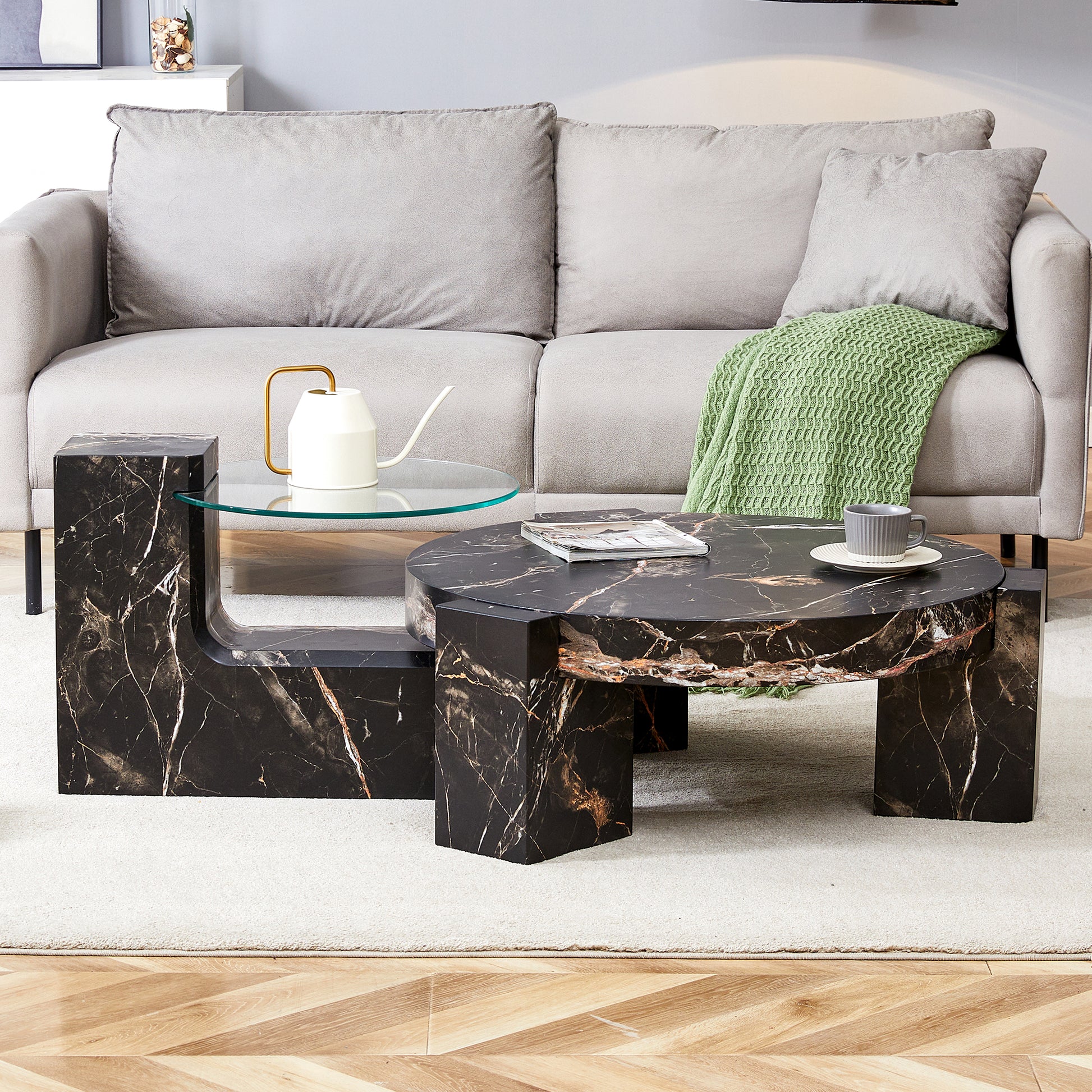 Modern black marble coffee table set with gold accents and glass top