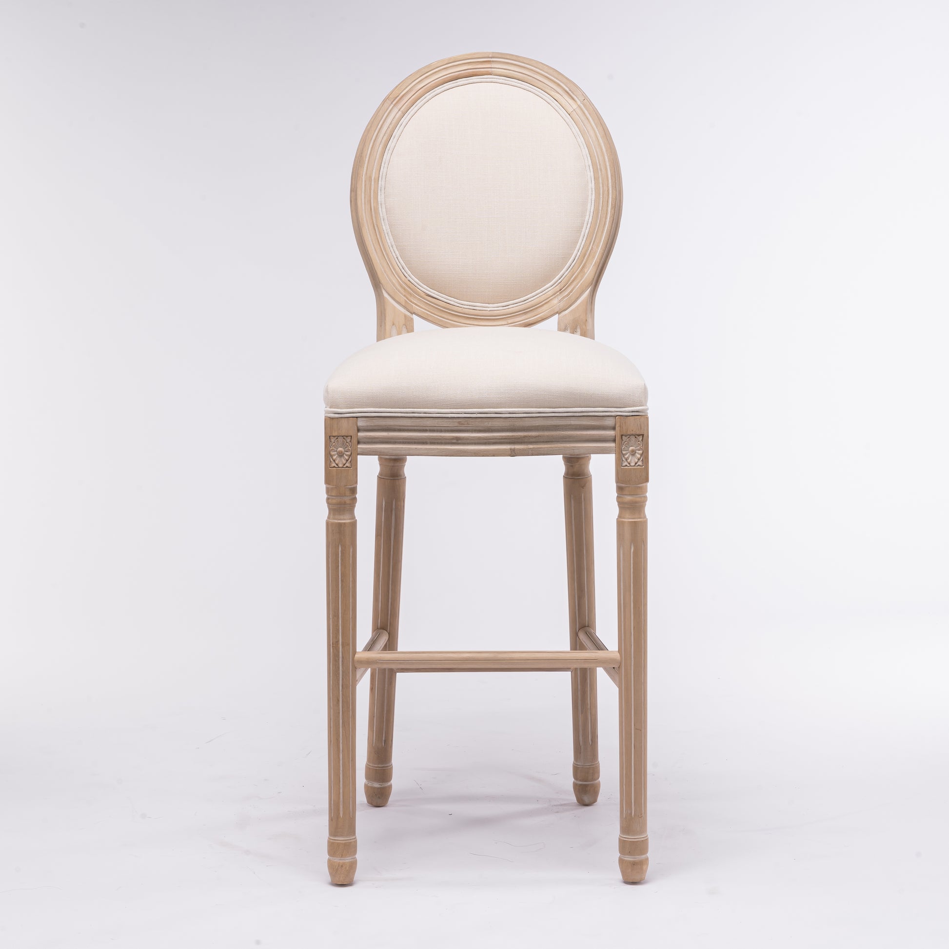 French country style bar stool with light wood frame and natural linen upholstery