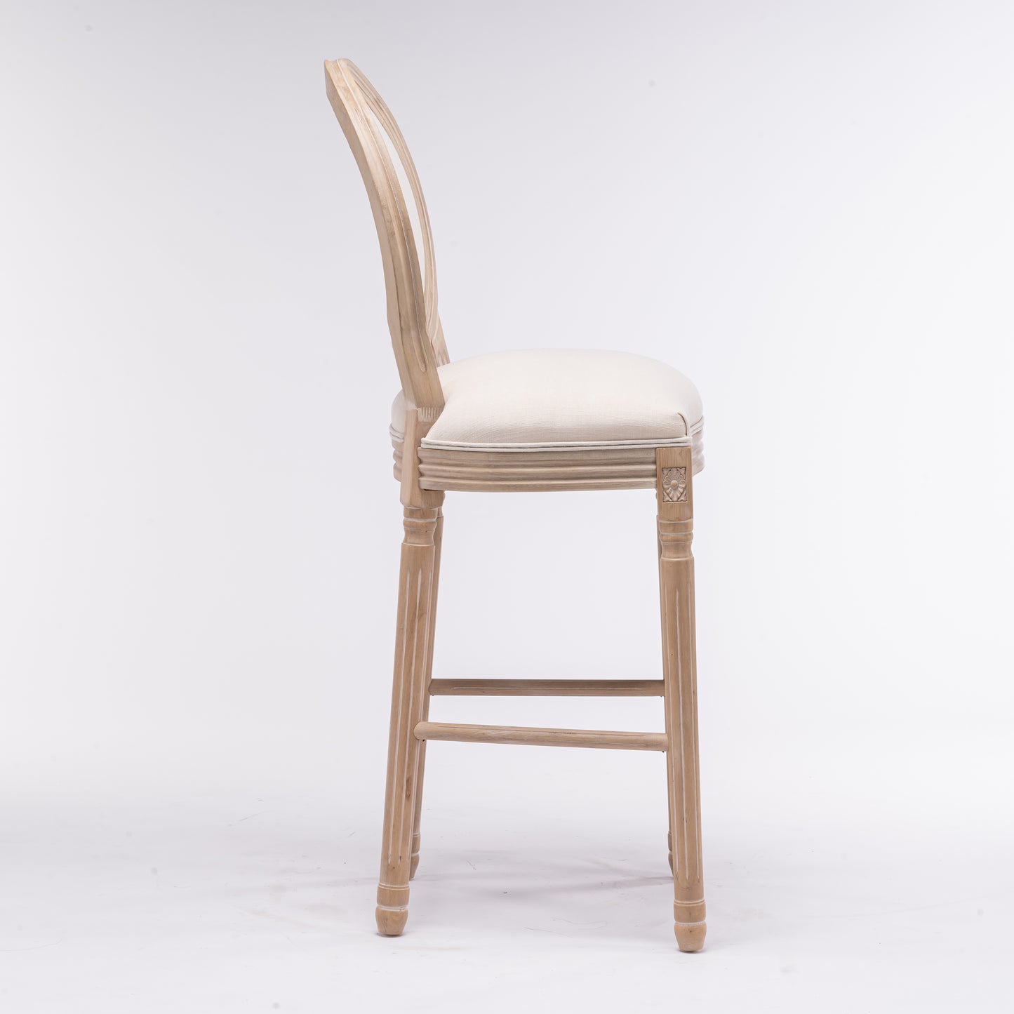 Light wood carved accent bar stool with cream fabric seat