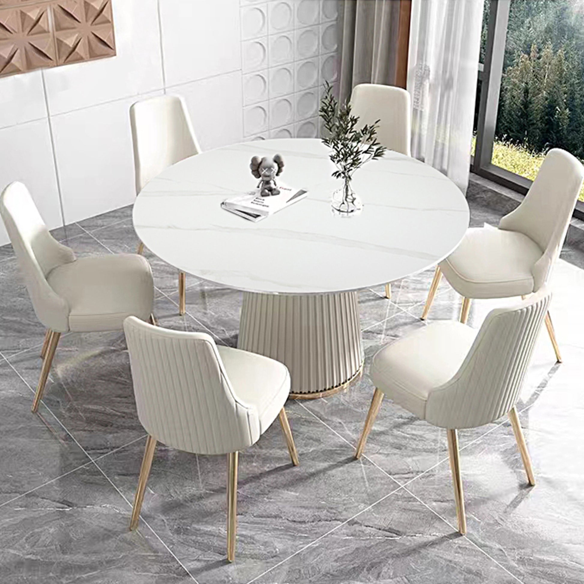 Round white marble top dining table with fluted pedestal base