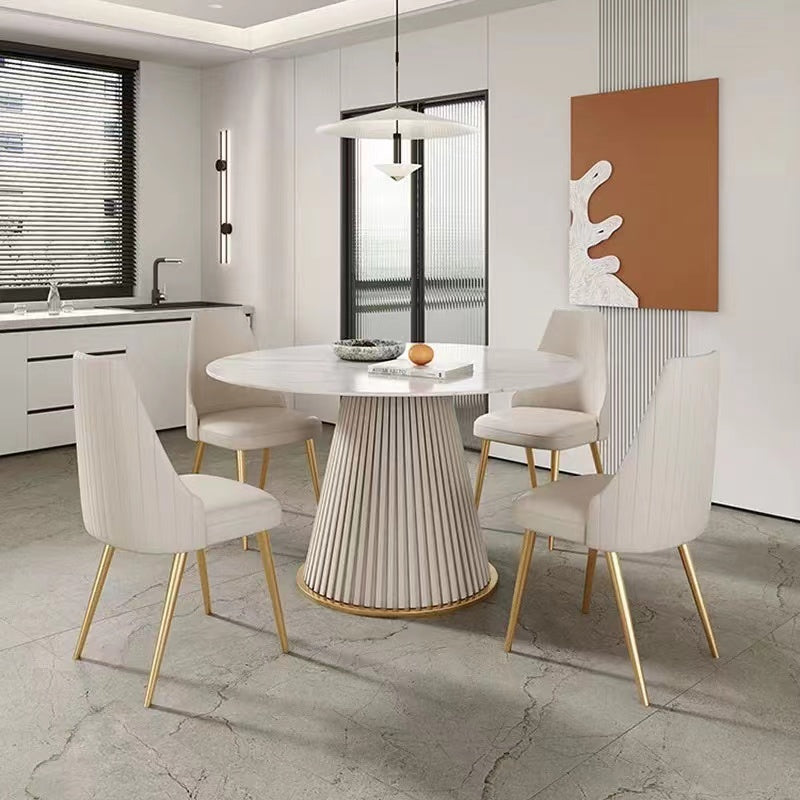 White marble dining table with fluted pedestal base