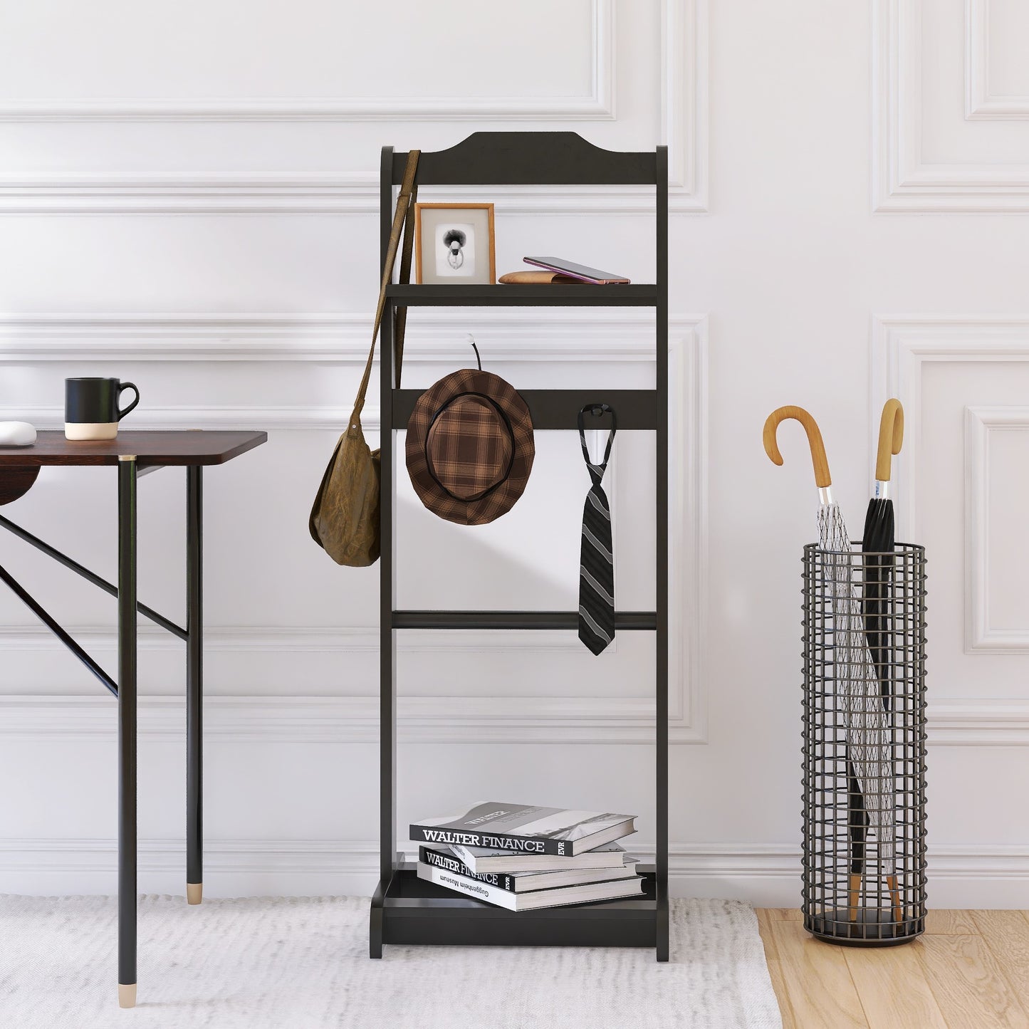Black ladder shelf with tote bag plaid hat striped tie and books