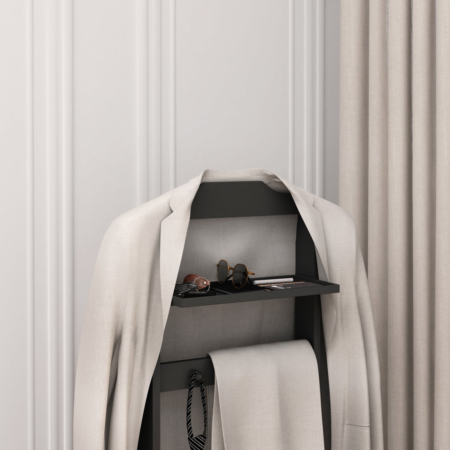 Beige linen suit jacket draped over a modern valet stand with accessories
