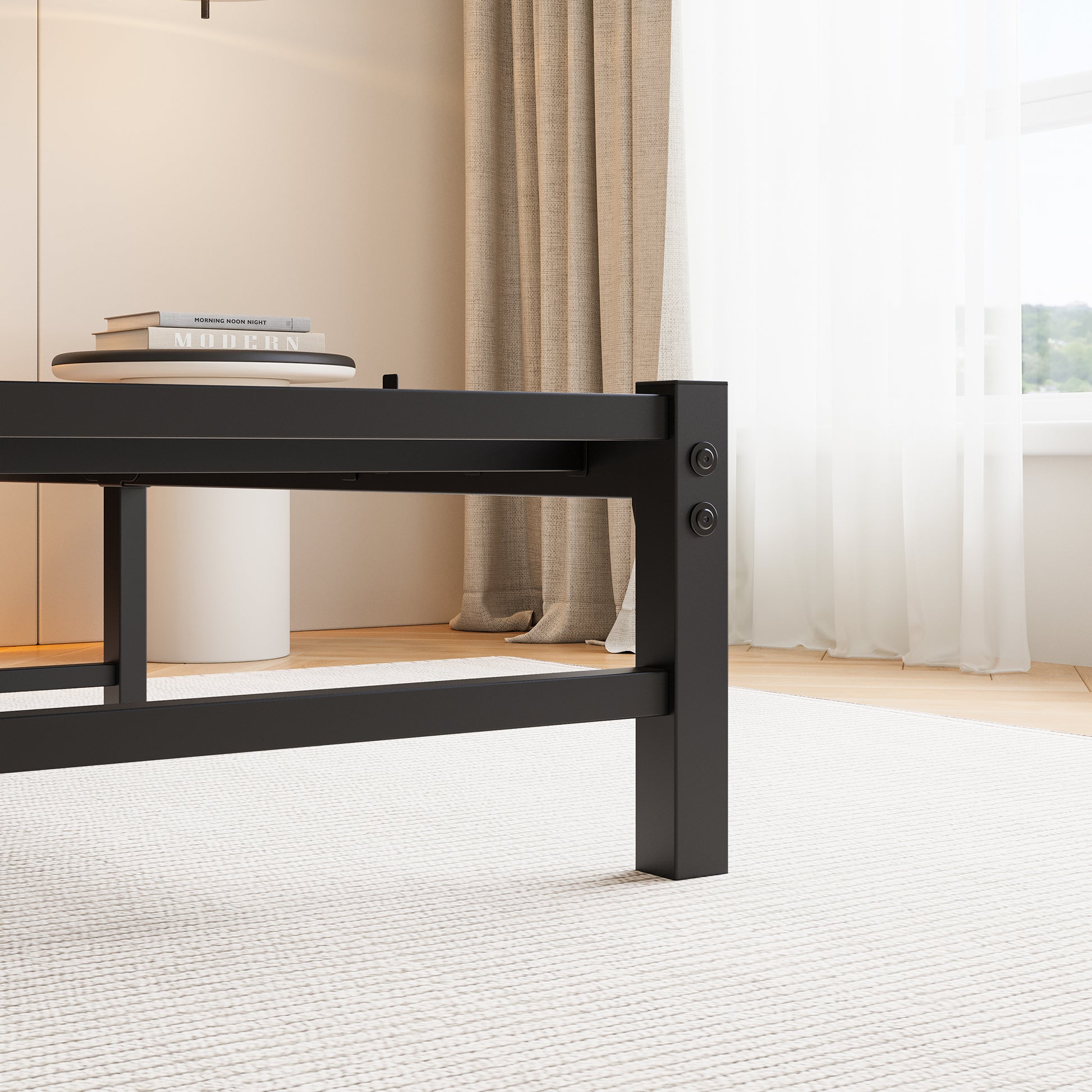 Black metal platform bed frame with sturdy legs on a textured rug