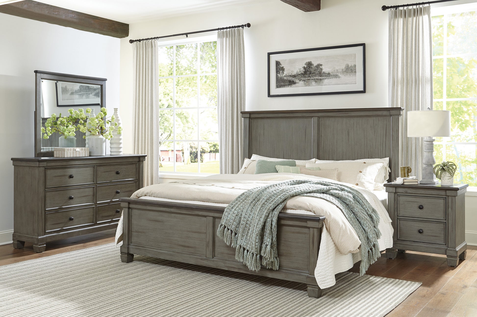 Gray wooden king size bed with paneled headboard and matching nightstand