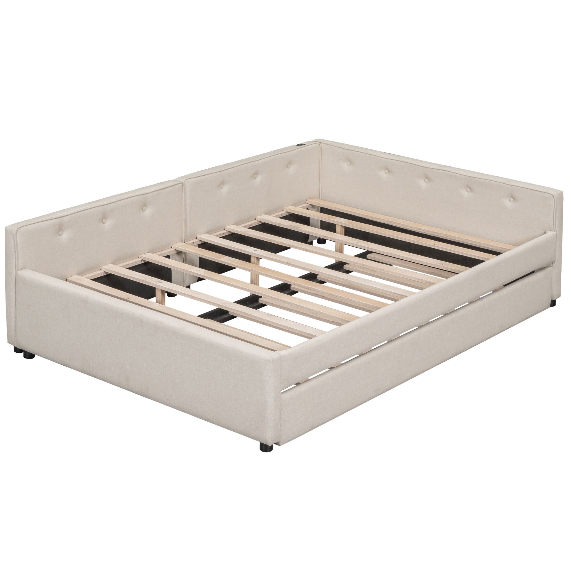 Cream upholstered daybed with a pullout trundle and wooden slat support