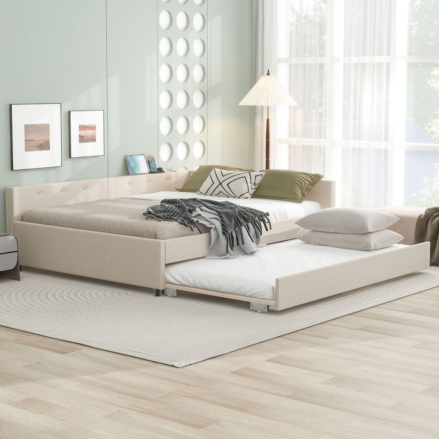 Beige upholstered daybed with pullout trundle tufted headboard and decorative pillows
