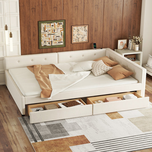 Cream upholstered sofa daybed with tufted accents and pullout drawers