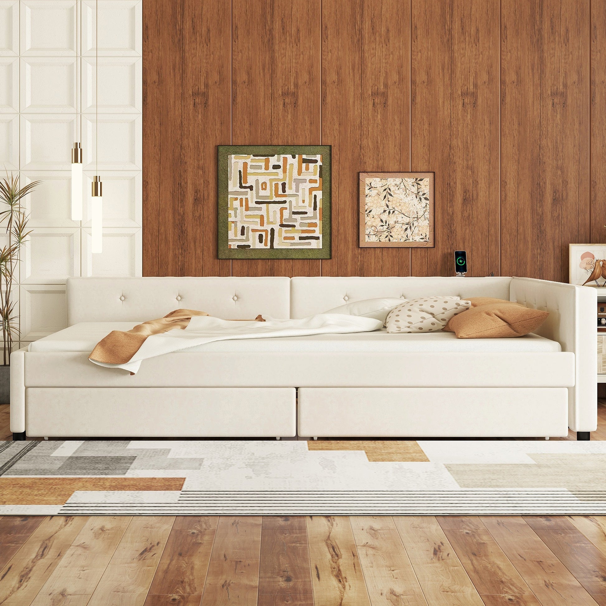 Cream fabric sofa bed with tufted back and storage drawers