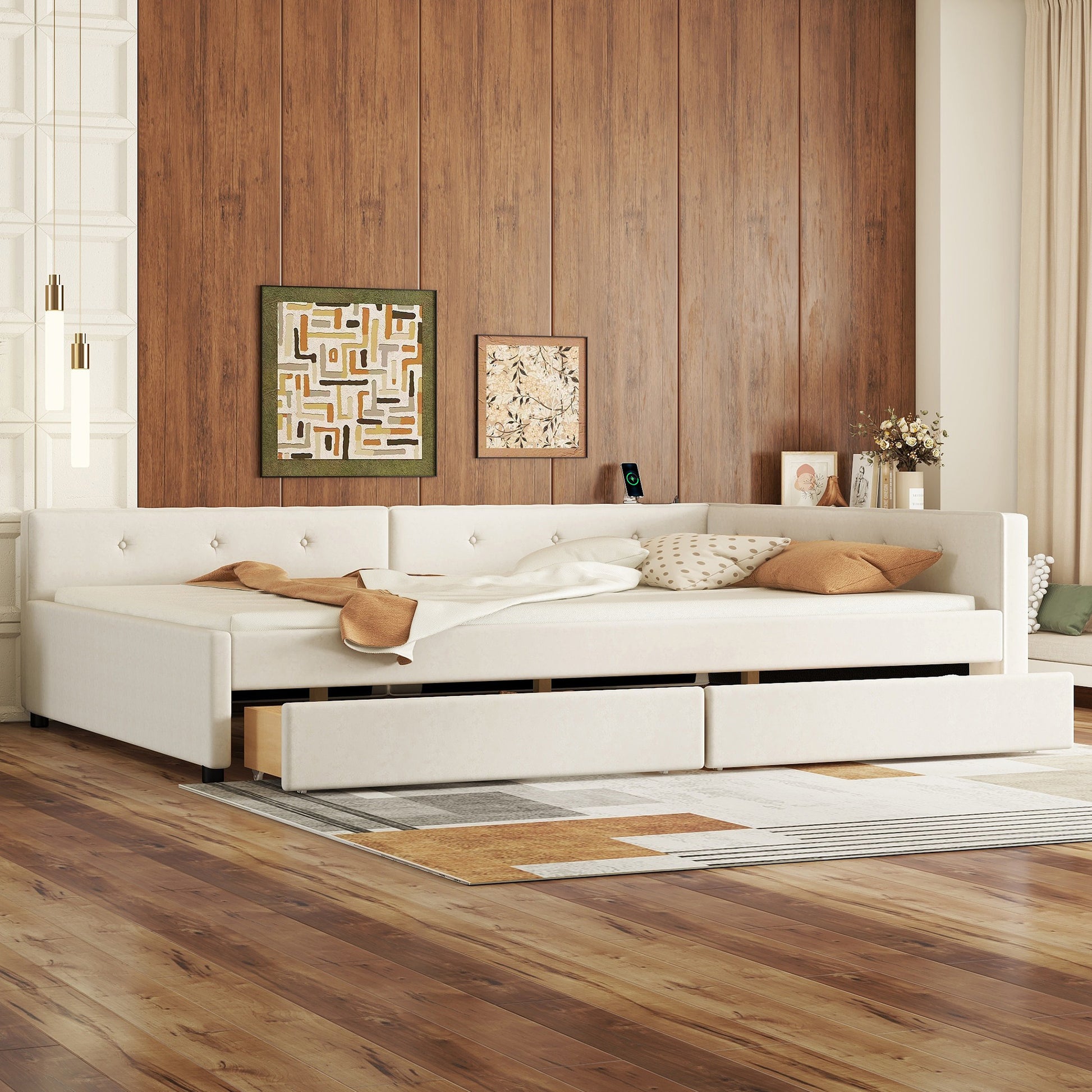 Cream upholstered daybed with pullout trundle and storage drawers