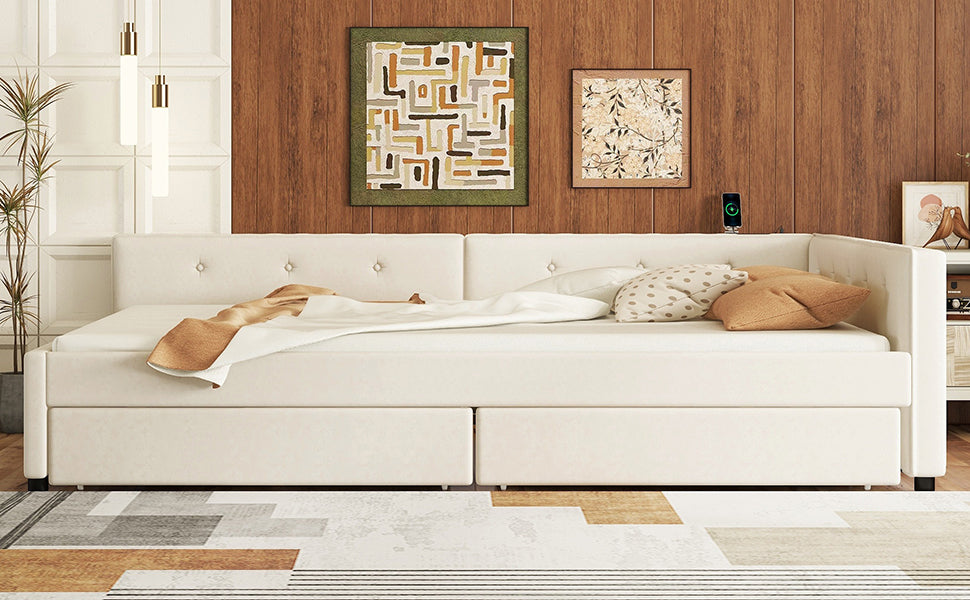 White upholstered daybed with two storage drawers and plush cushions
