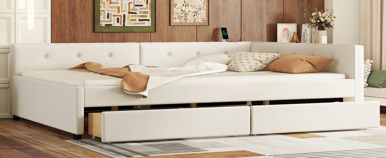 Cream upholstered daybed with tufted back and two pullout storage drawers