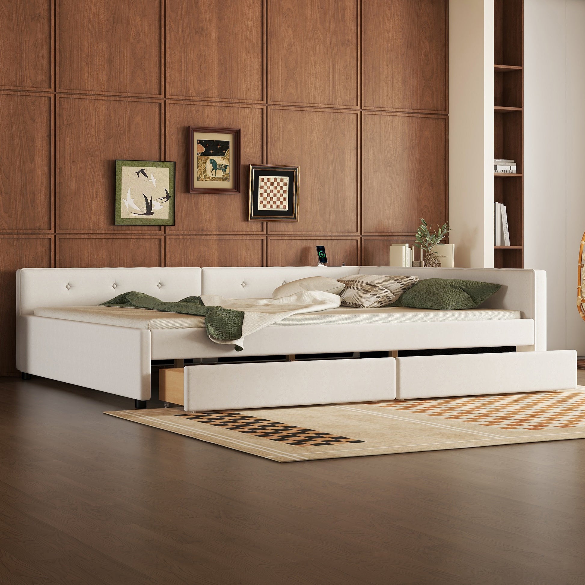 White upholstered daybed with pullout trundle and three storage drawers