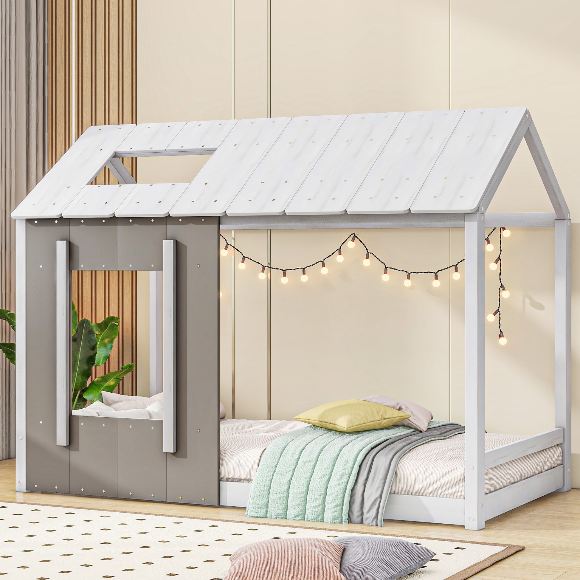 White and grey wooden house bed frame with fairy lights and bedding