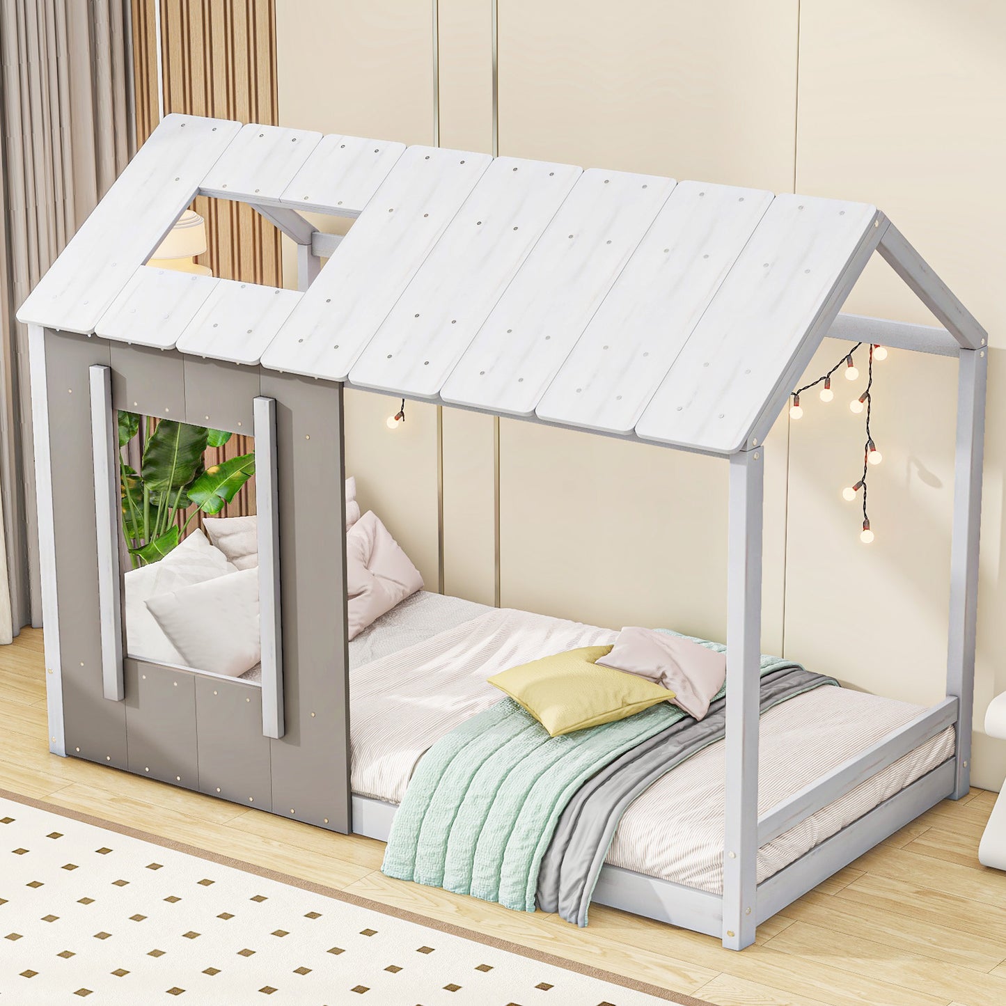 Gray and white wooden house bed frame with string lights and bedding