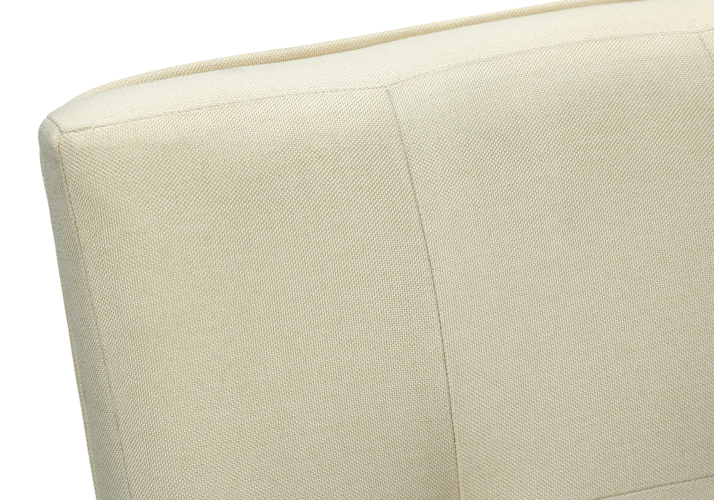 Textured cream fabric upholstery detail on modern armchair