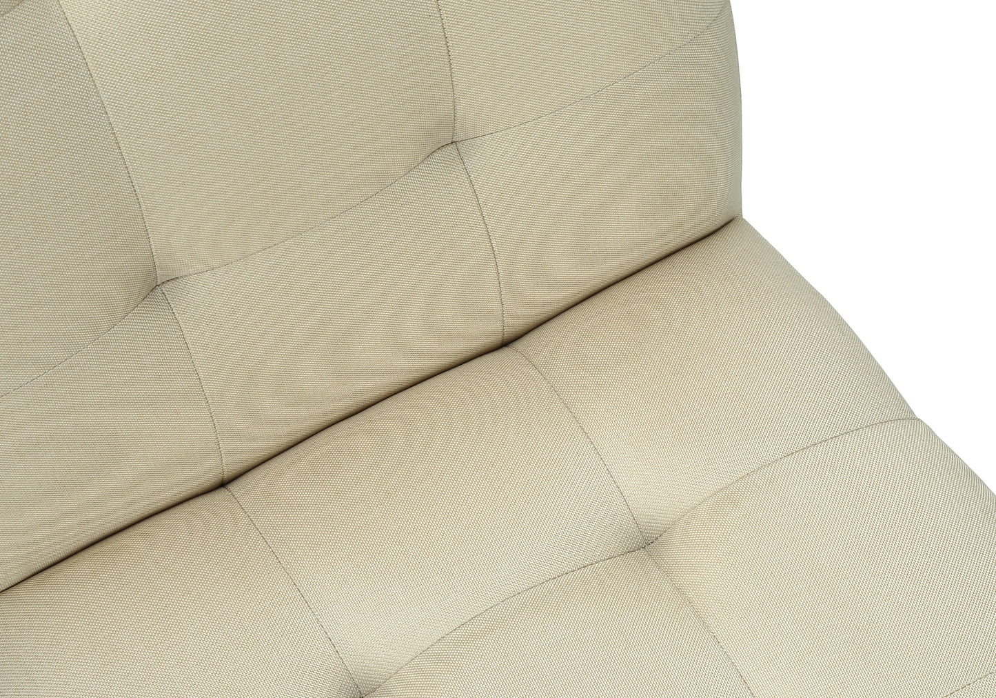 Closeup of tufted beige fabric texture on a sofa