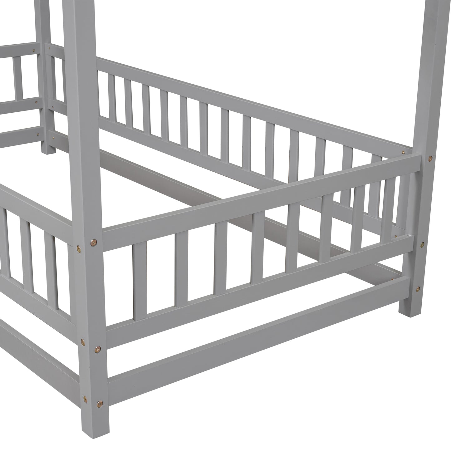Gray wooden crib with safety rails