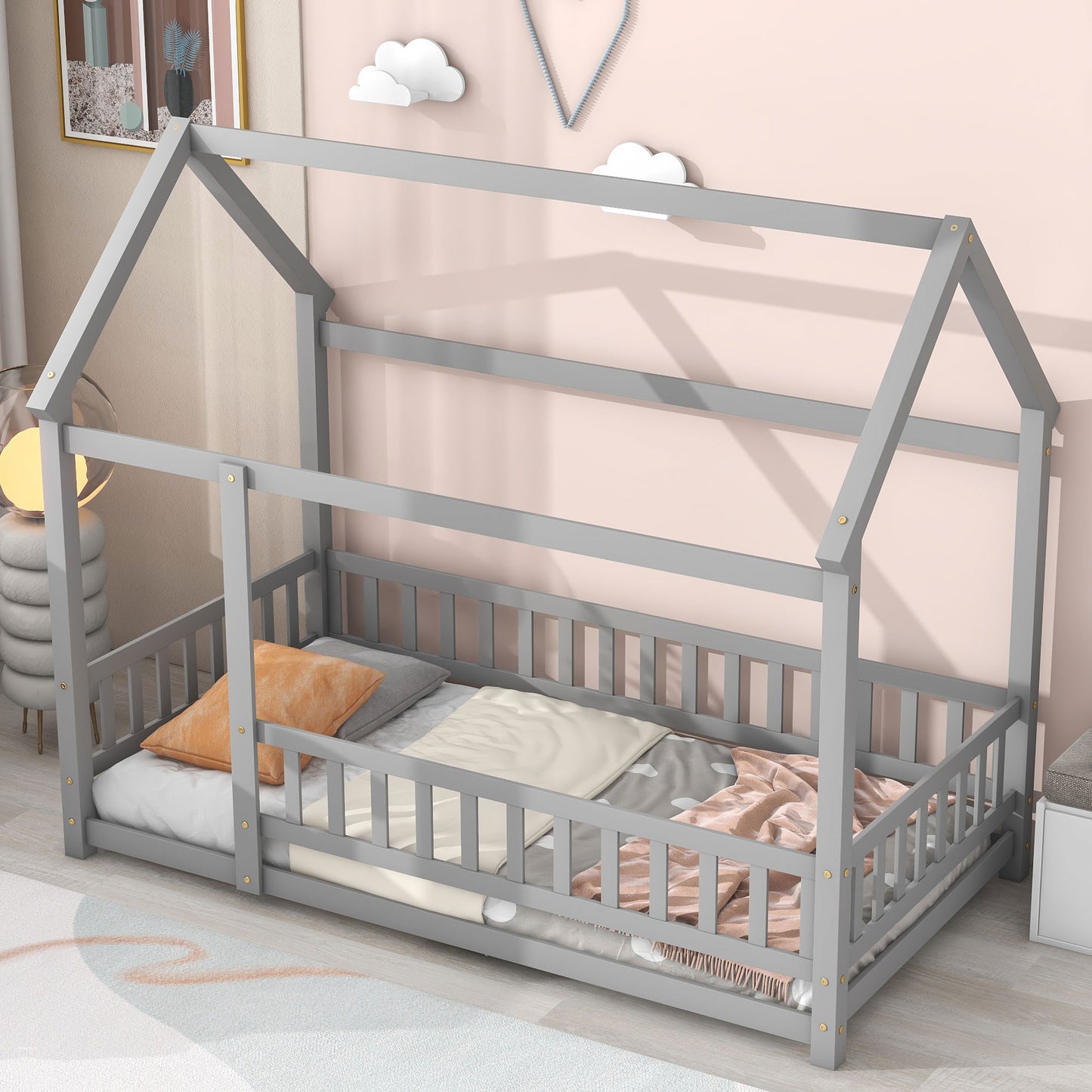 Gray wooden house bed frame with safety rails and bedding