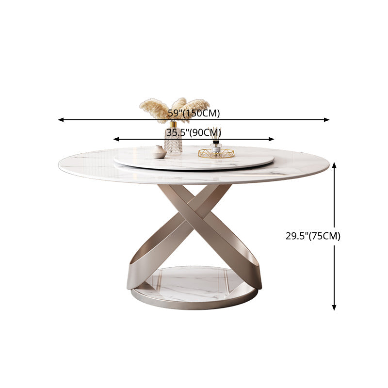 Modern white marble dining table with a unique crossed pedestal base and a rotating lazy susan