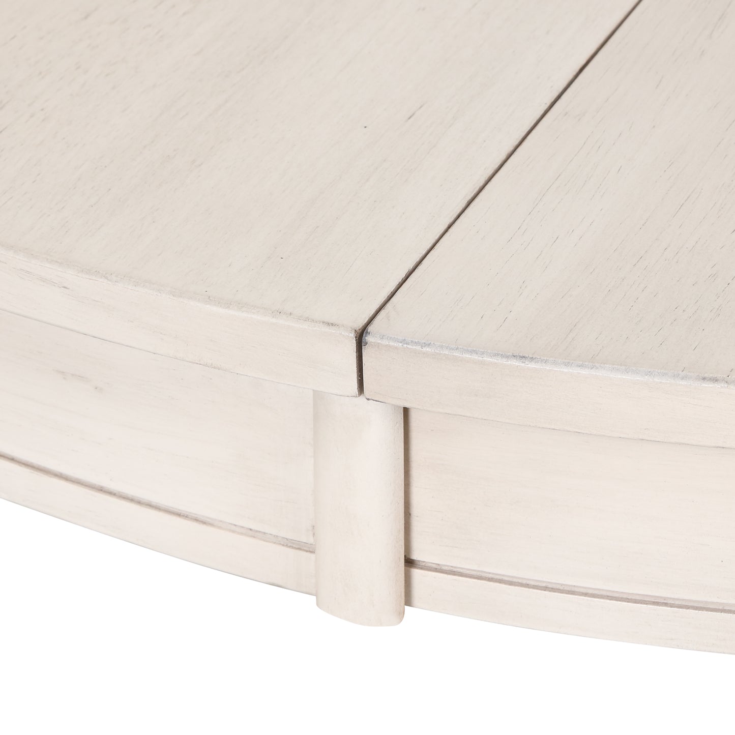 Closeup of distressed white painted wooden table edge with visible grain