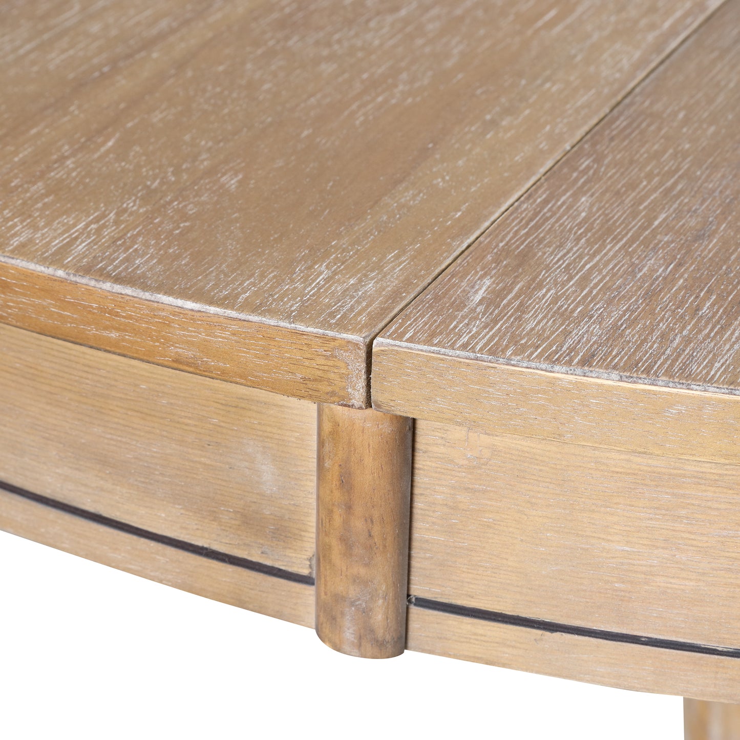 Closeup of light oak wood table surface with distressed finish