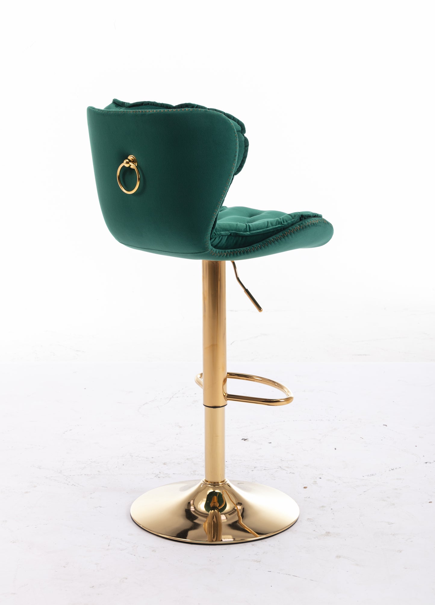 Elegant green velvet bar stool with gold accents and adjustable height