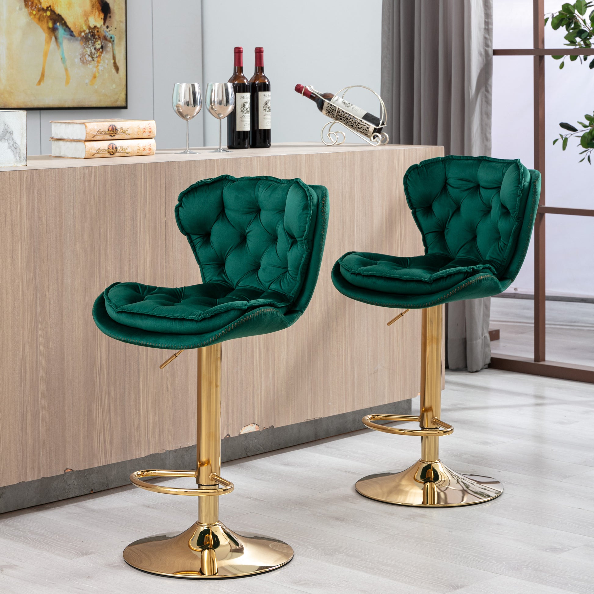 Emerald green velvet bar stool with tufted back and gold base