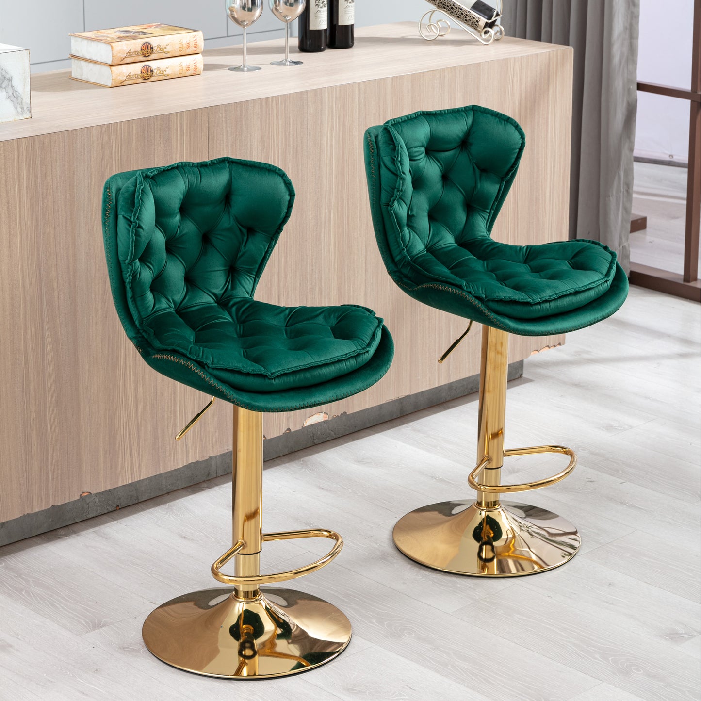 Deep green velvet tufted bar stool with gold adjustable base