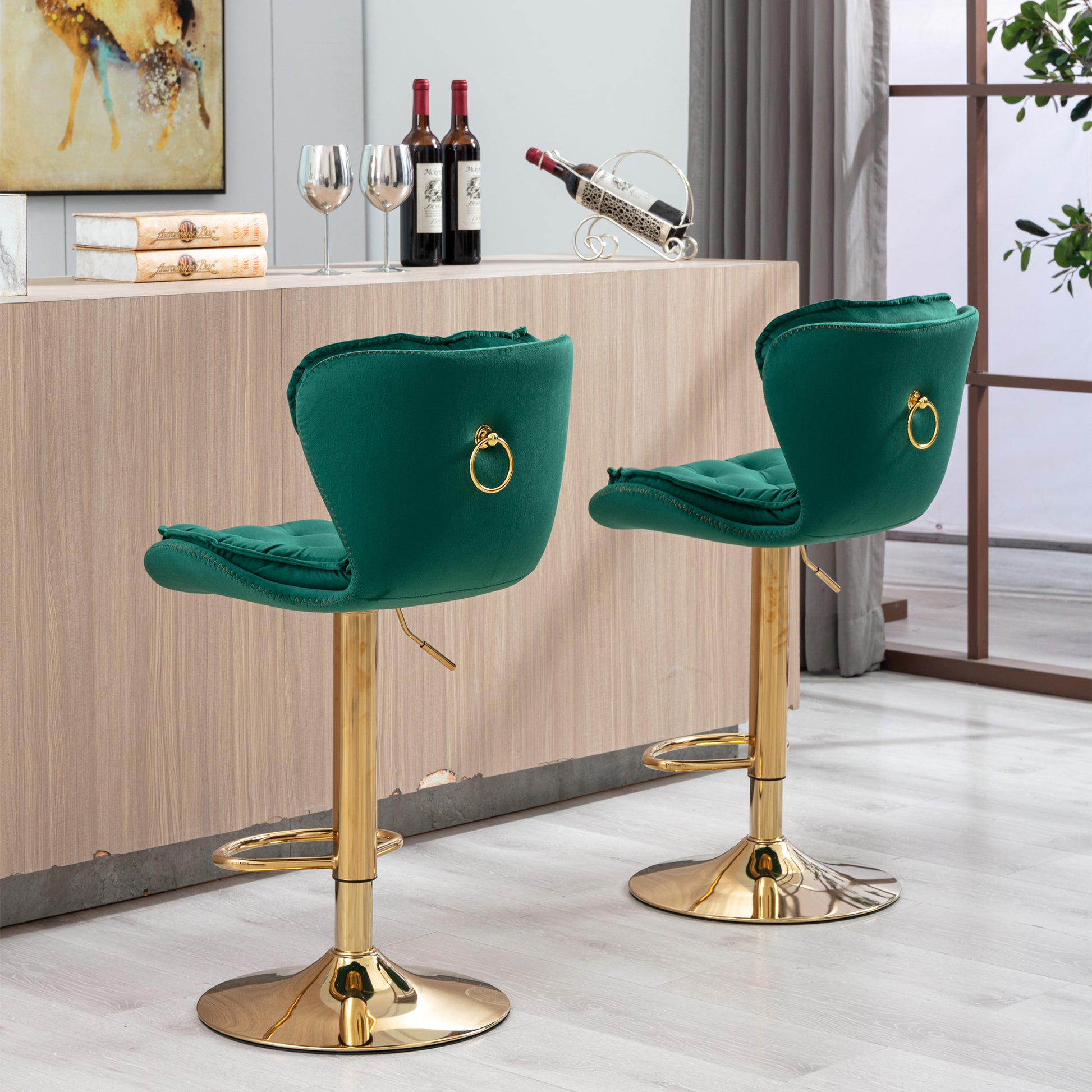 Emerald green velvet bar stool with gold ring detail and adjustable base