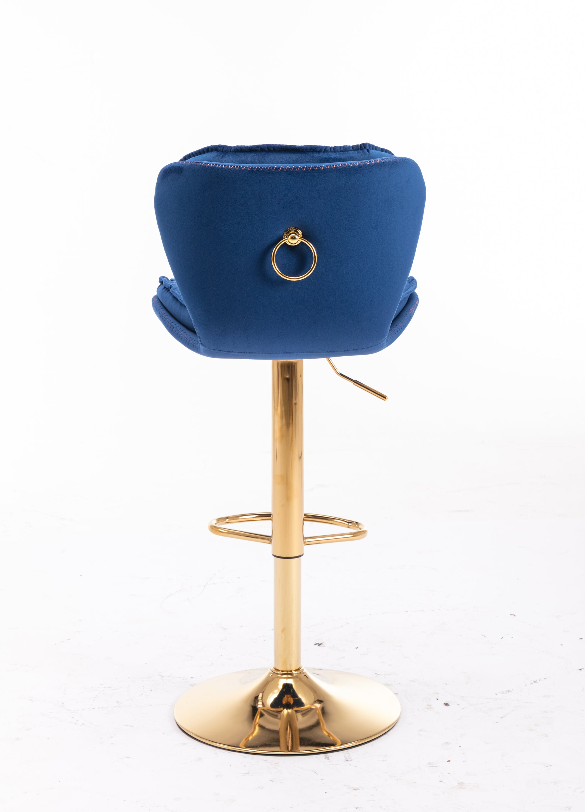 Deep blue velvet bar stool with gold ring detail on back