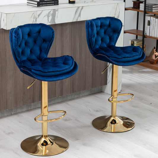 Deep blue velvet tufted bar stool with gold adjustable pedestal base