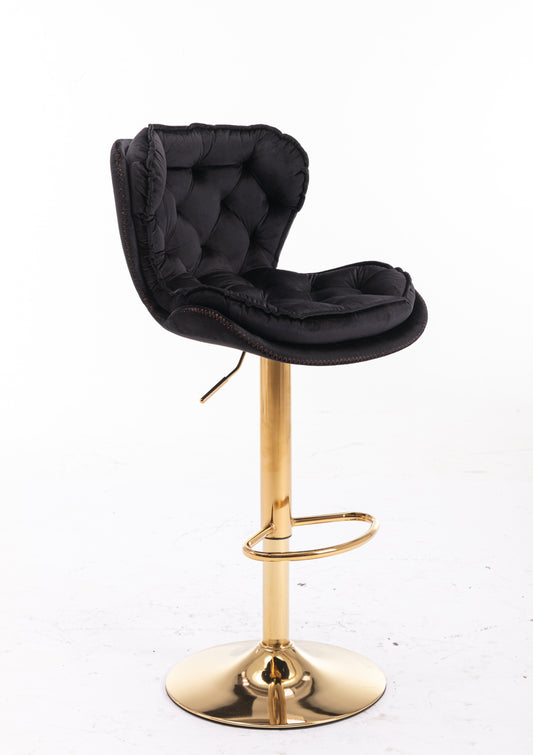 Black velvet bar stool with tufted back and gold base
