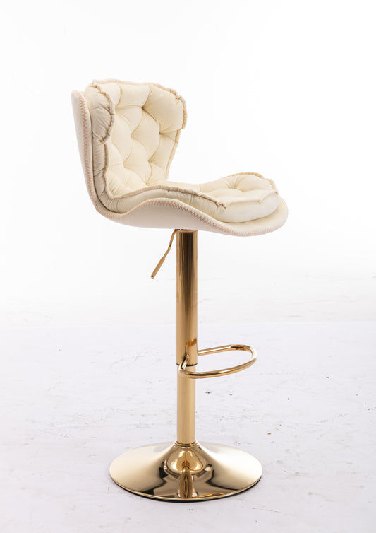 Cream tufted bar stool with gold base and footrest