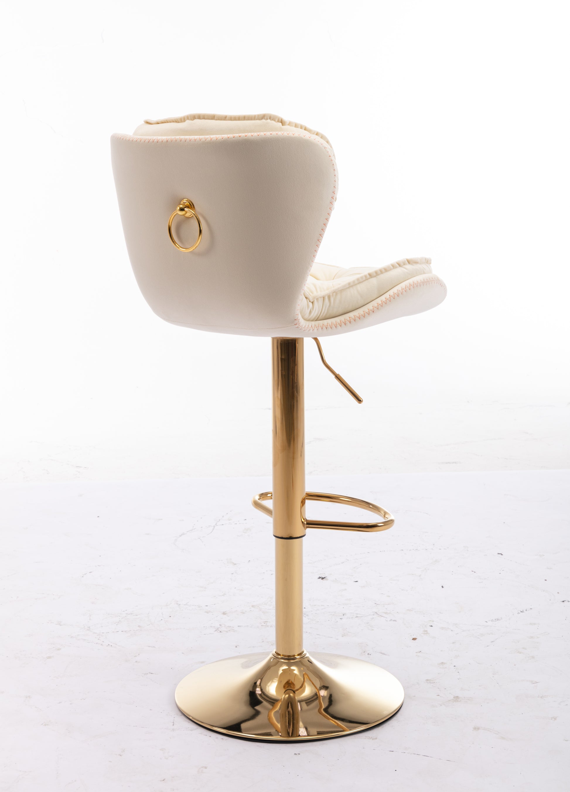 Cream velvet adjustable bar stool with gold base and ring detail