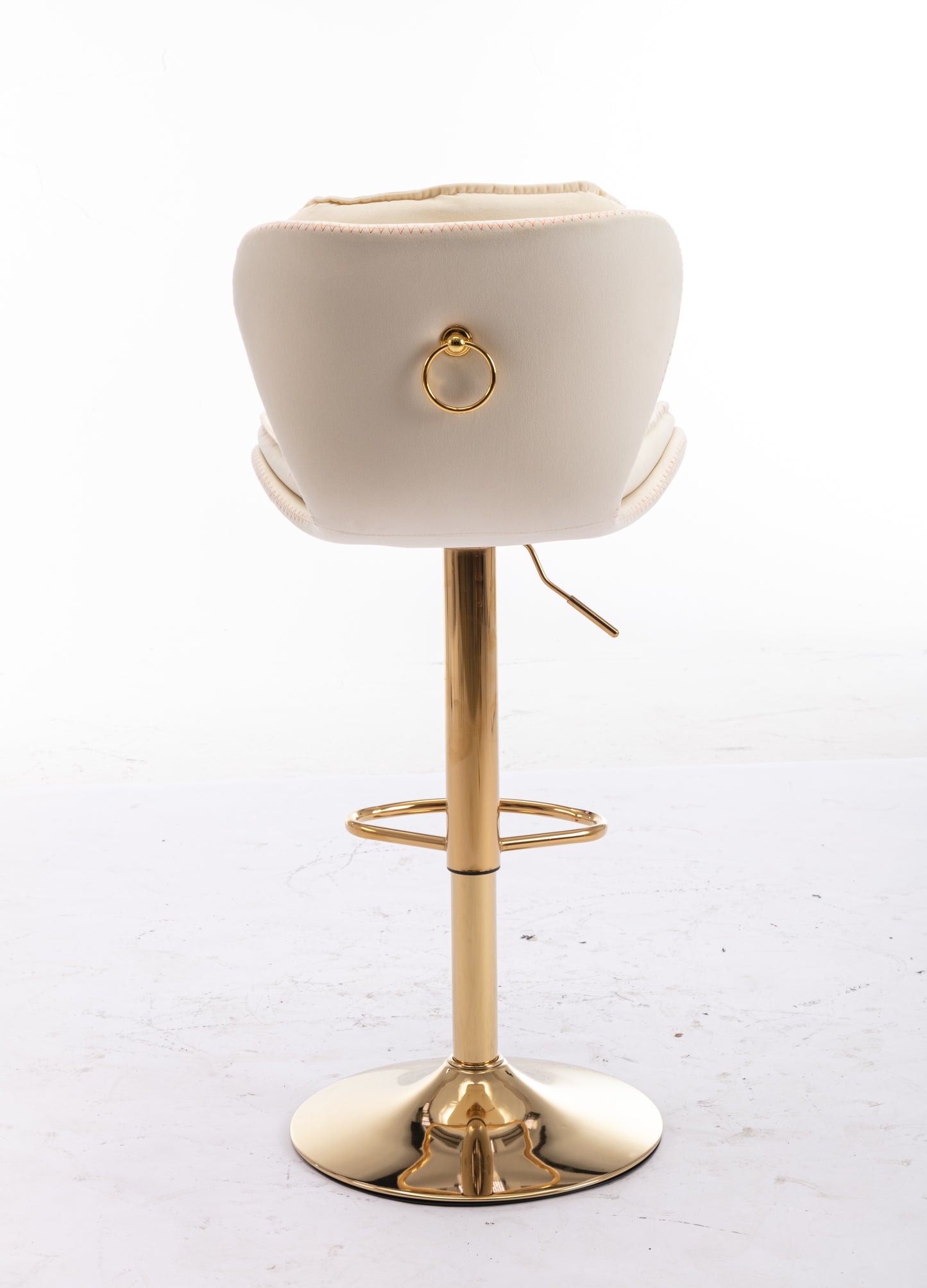 Cream upholstered bar stool with gold ring detail and base