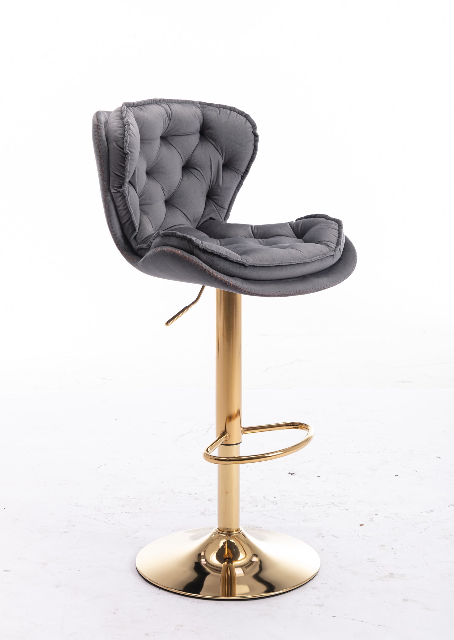 Gray velvet tufted bar stool with adjustable gold base