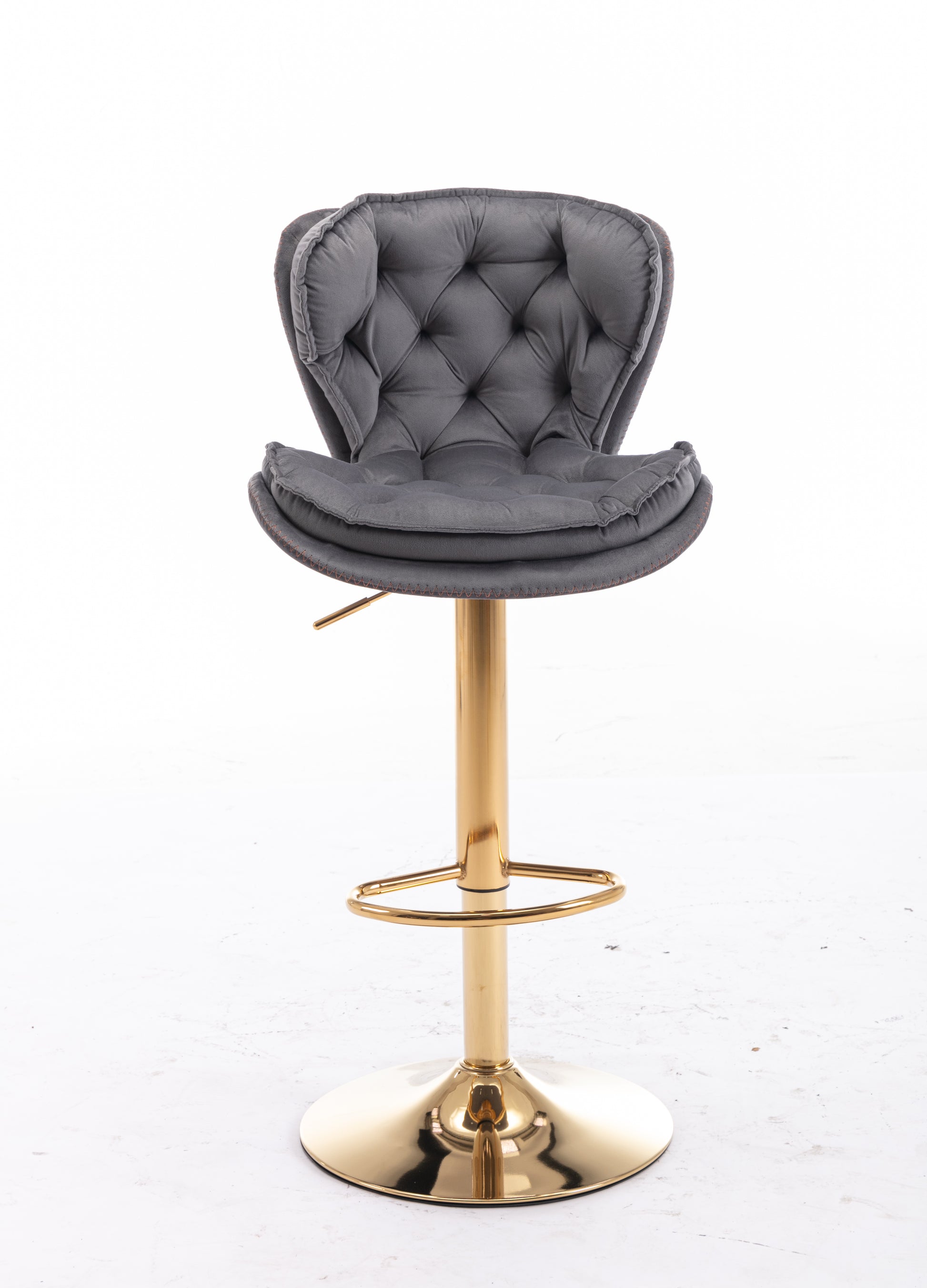 Gray velvet bar stool with tufted back and gold base