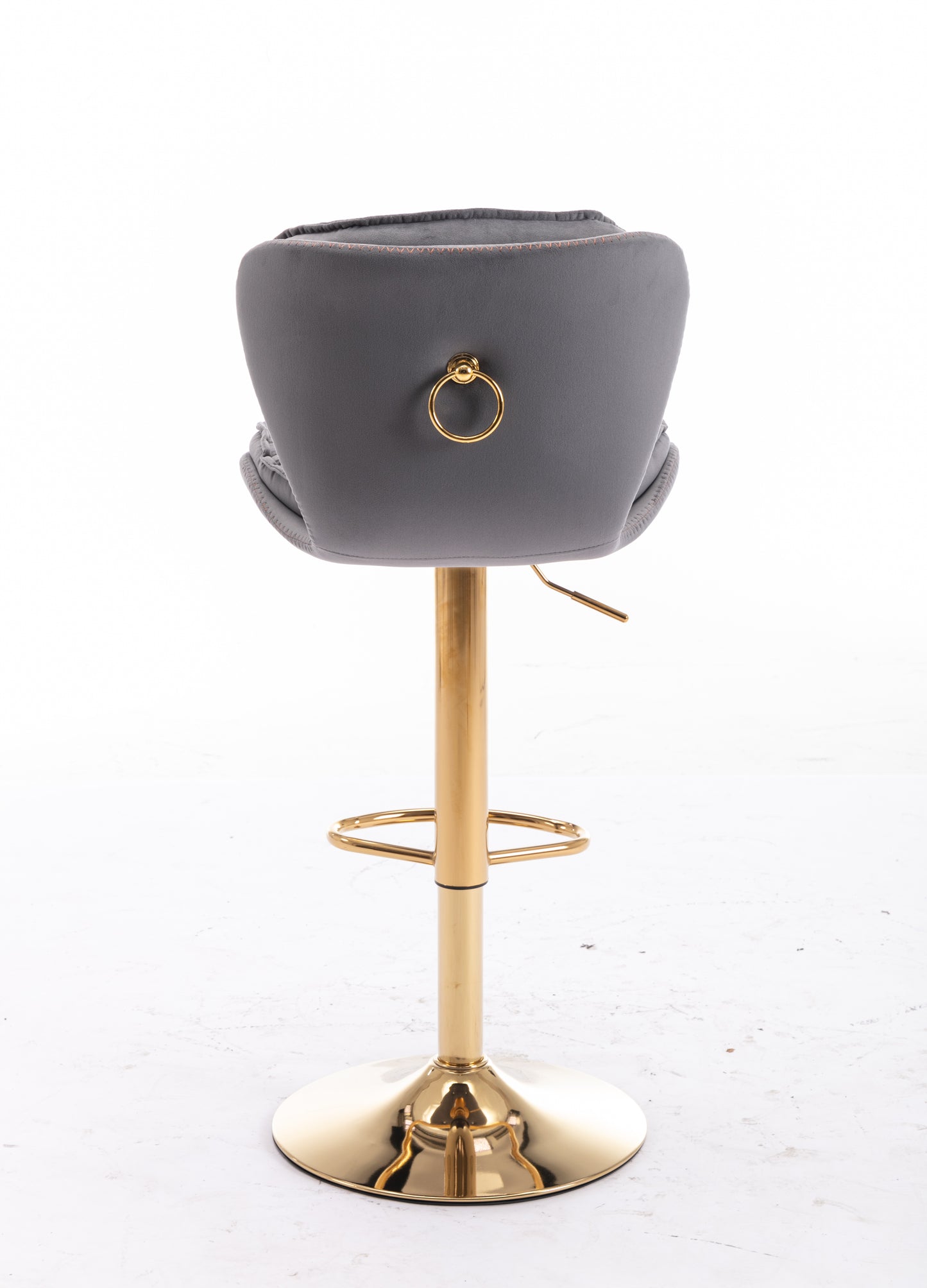 Grey velvet bar stool with gold ring detail and gold pedestal base