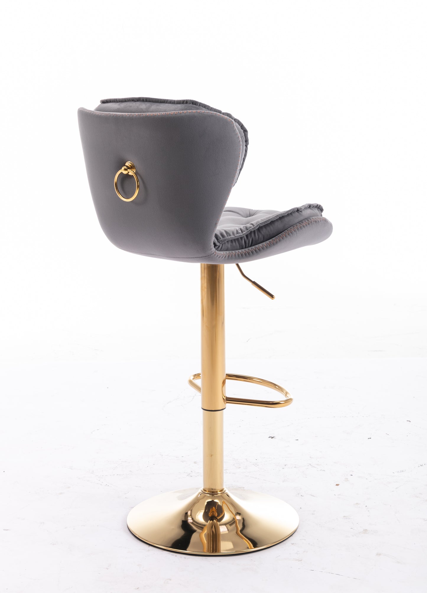 Grey velvet bar stool with gold ring detail and base