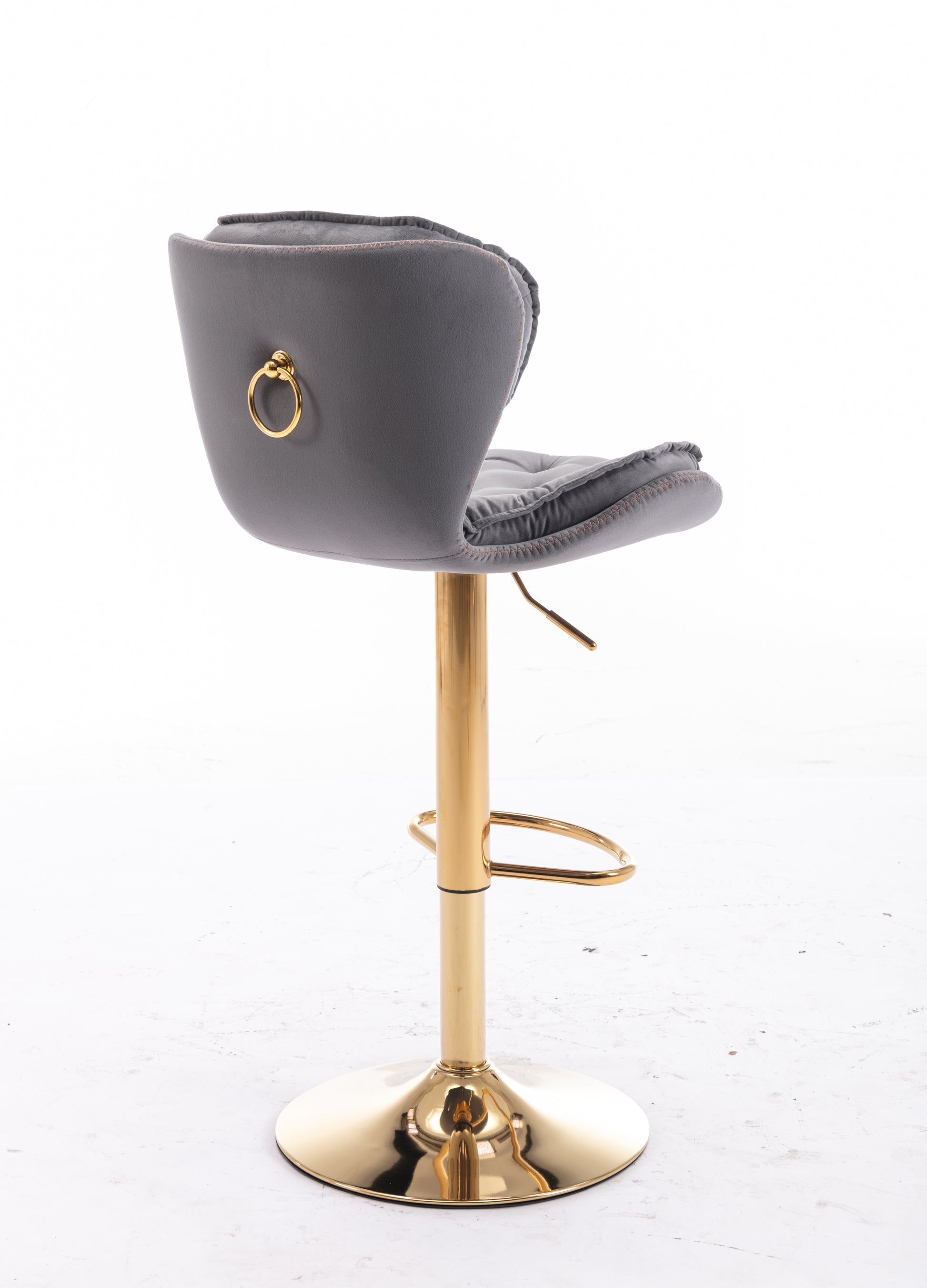 Grey velvet bar stool with gold ring detail and base