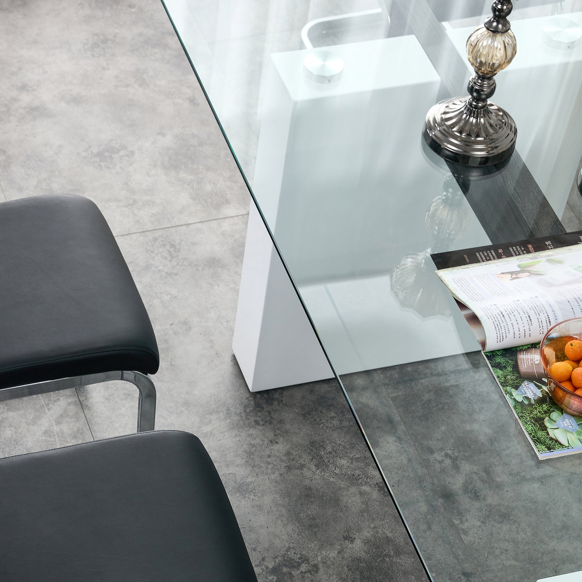 Black leather dining chair with chrome legs