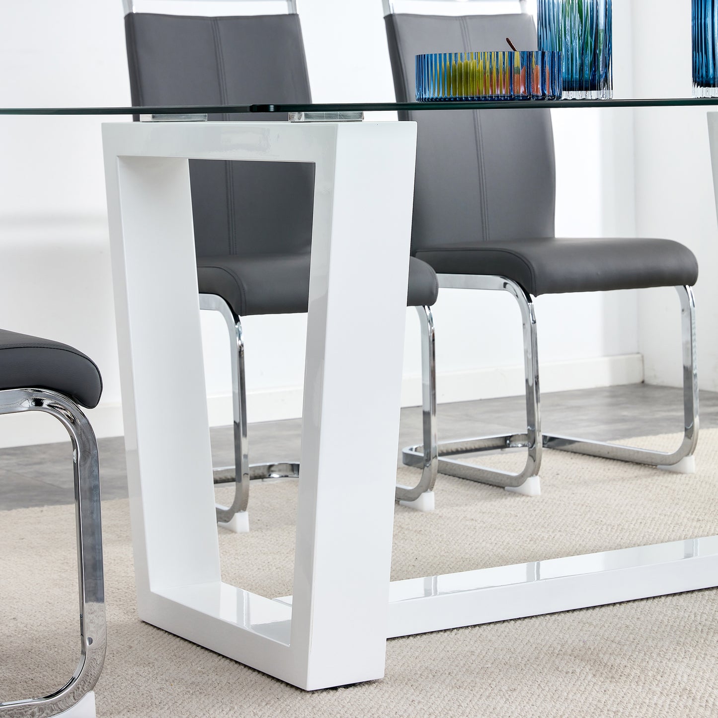 Modern white gloss dining table with chrome legs