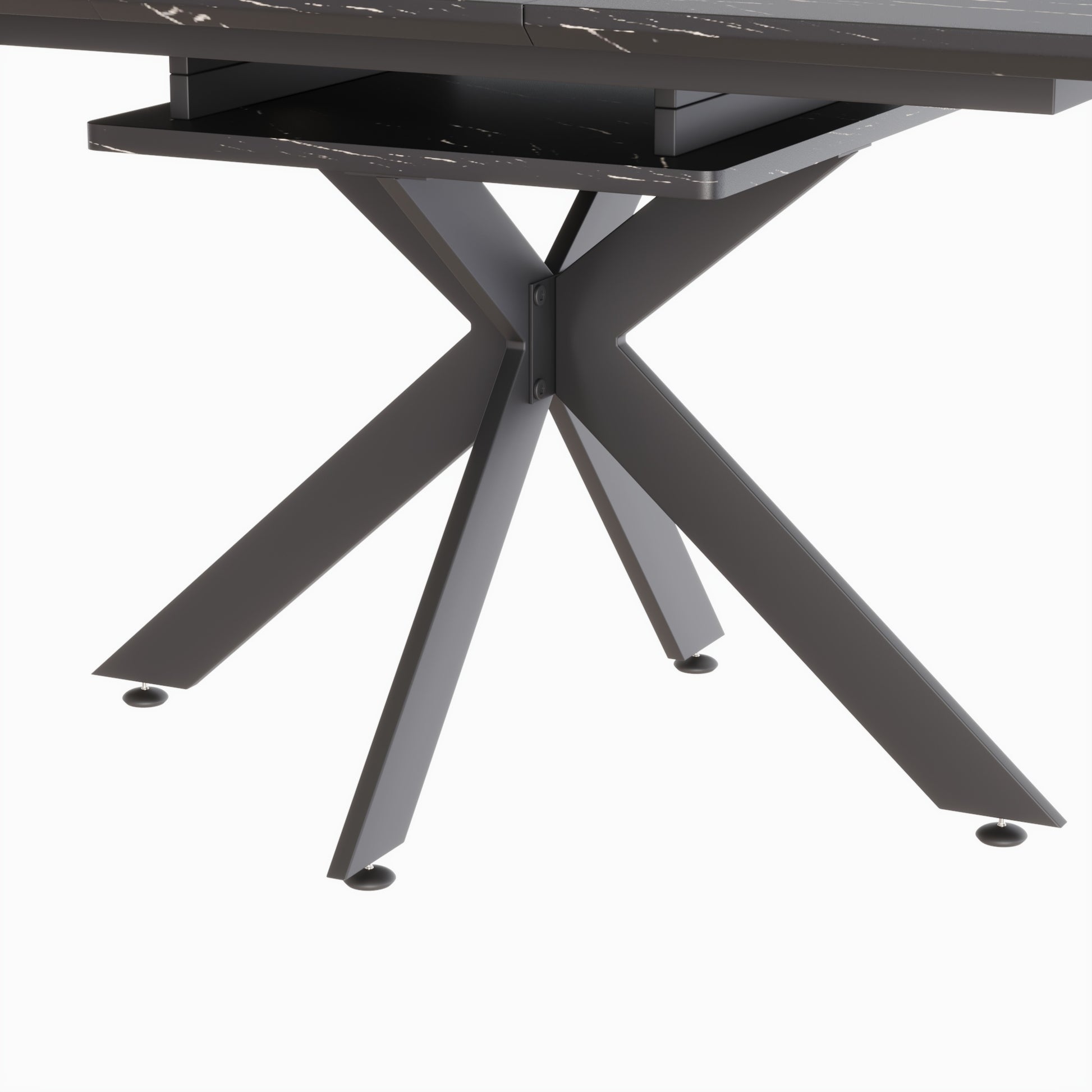 Closeup of dark marble tabletop with faux white veining on a sleek Xshaped metal table leg