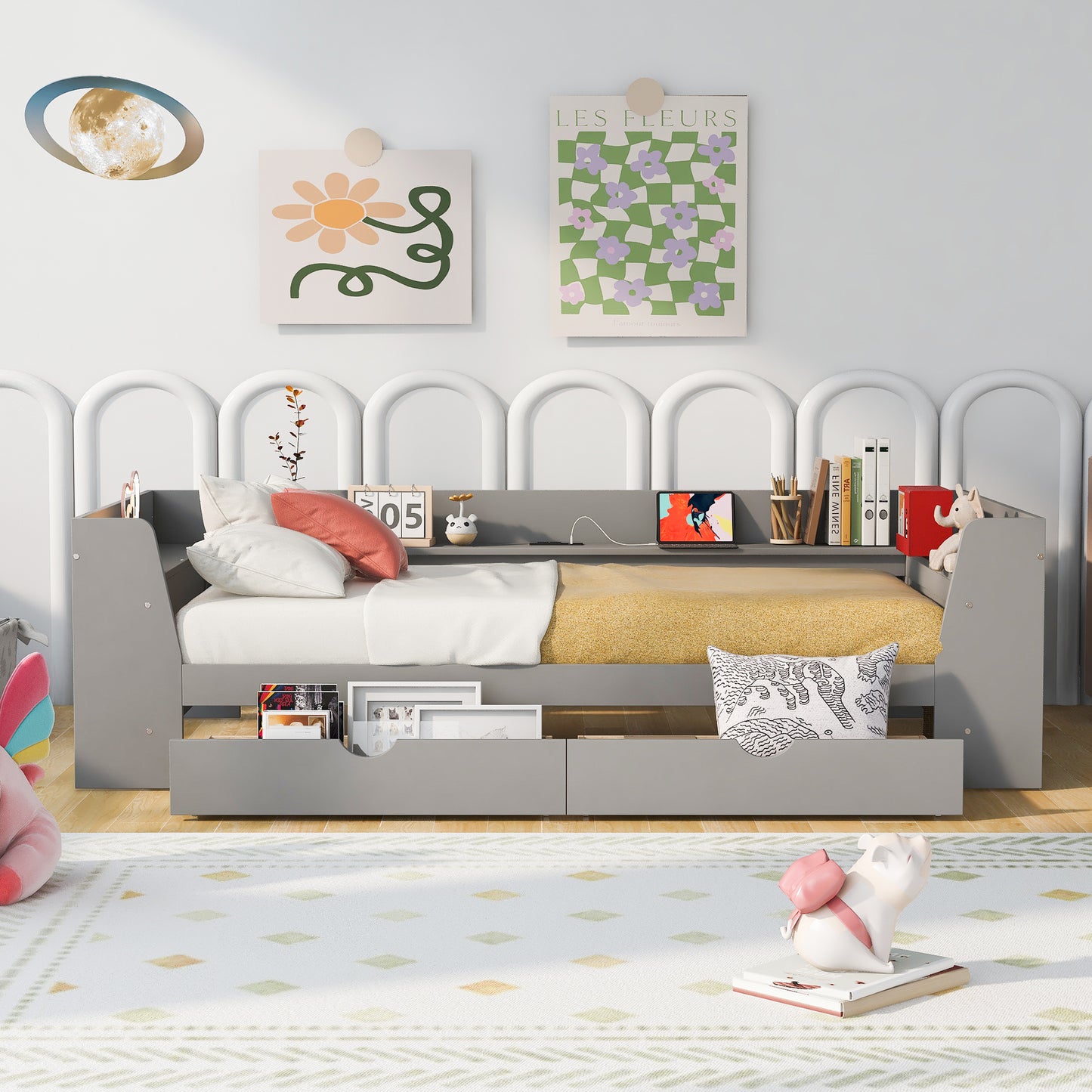 Gray toddler bed with storage drawers and yellow bedding