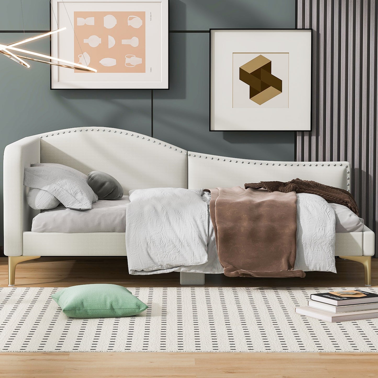 White velvet daybed with silver nailhead trim and gold legs