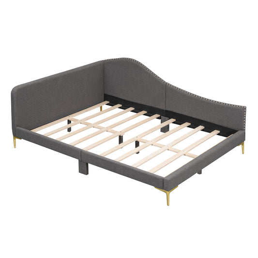 Grey upholstered bed frame with gold legs and wooden slats