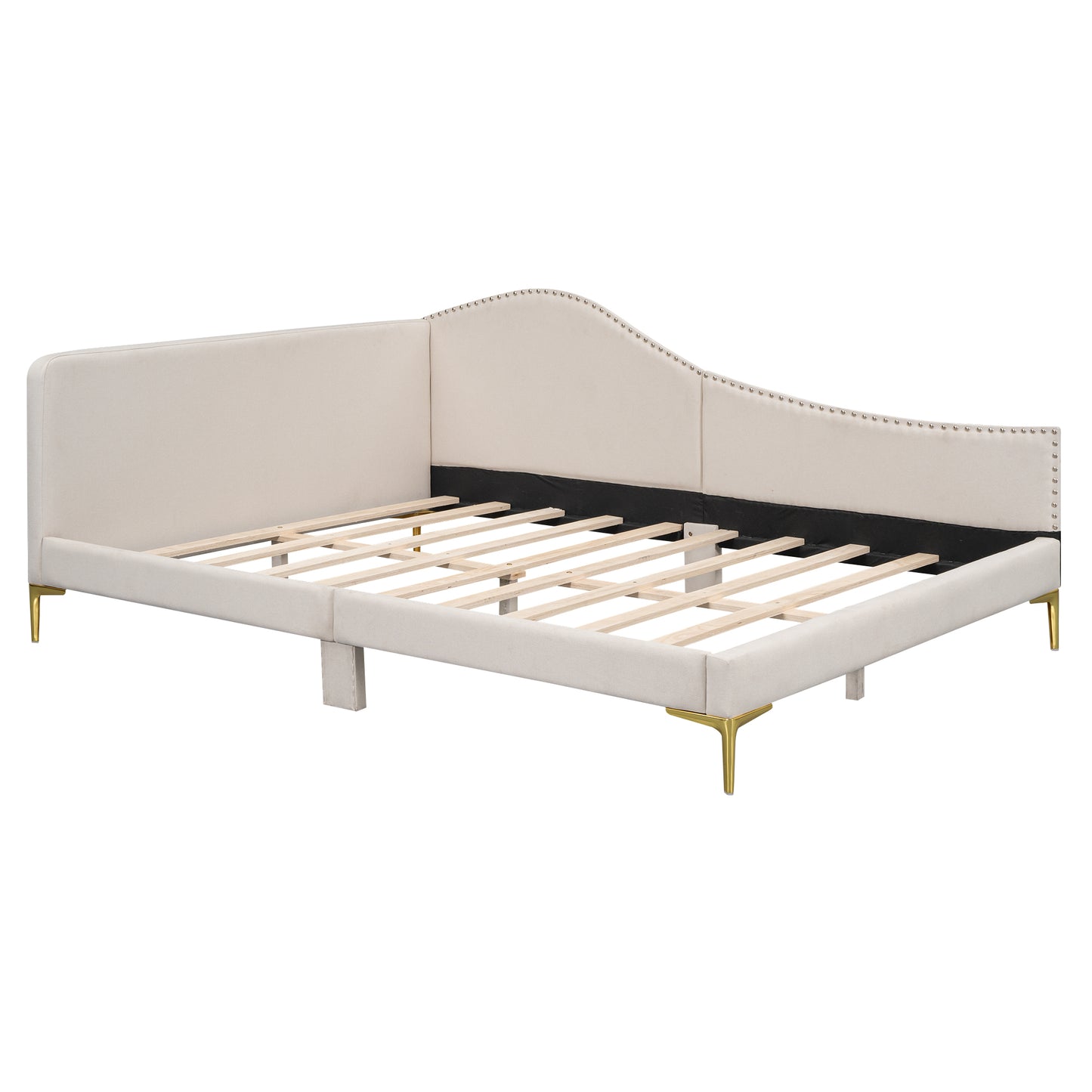 Cream upholstered daybed with gold legs and diamond tufting on curved headboard